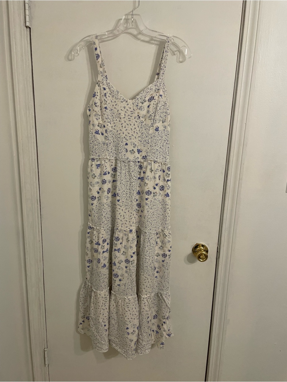 Sleeveless White Midi Dress with Blue Floral Print